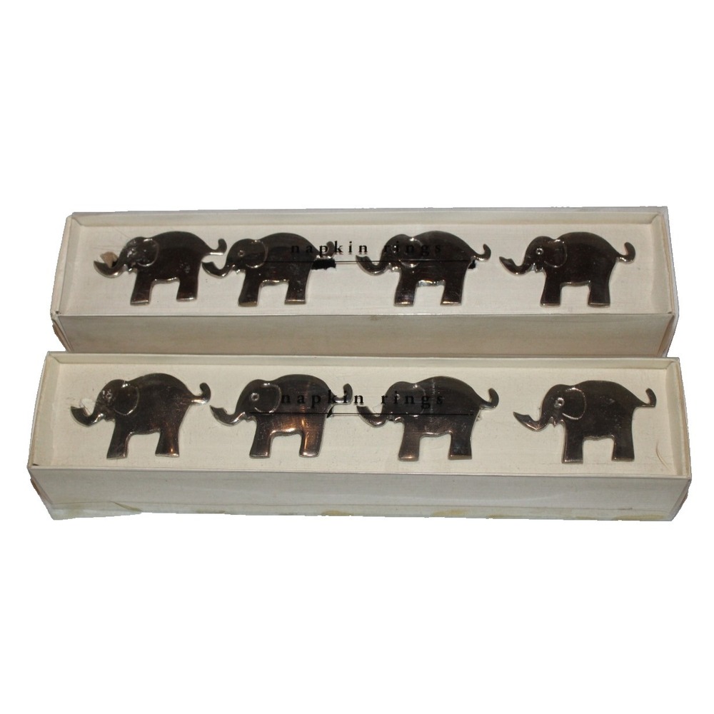 set of 8 Pier One nickel plated elephant napkin rings trunks up (2 boxes of 4)